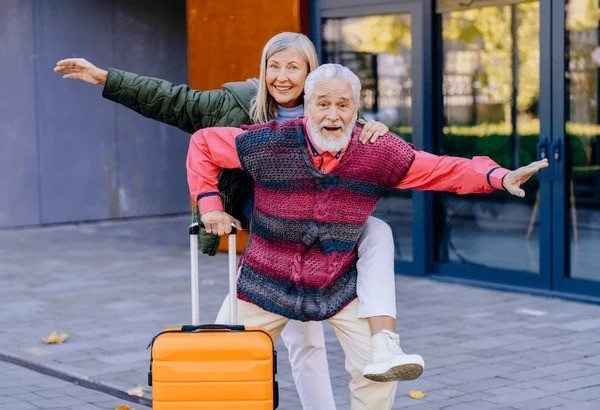 joyful elderly couple enjoying travel 600w 2547661493